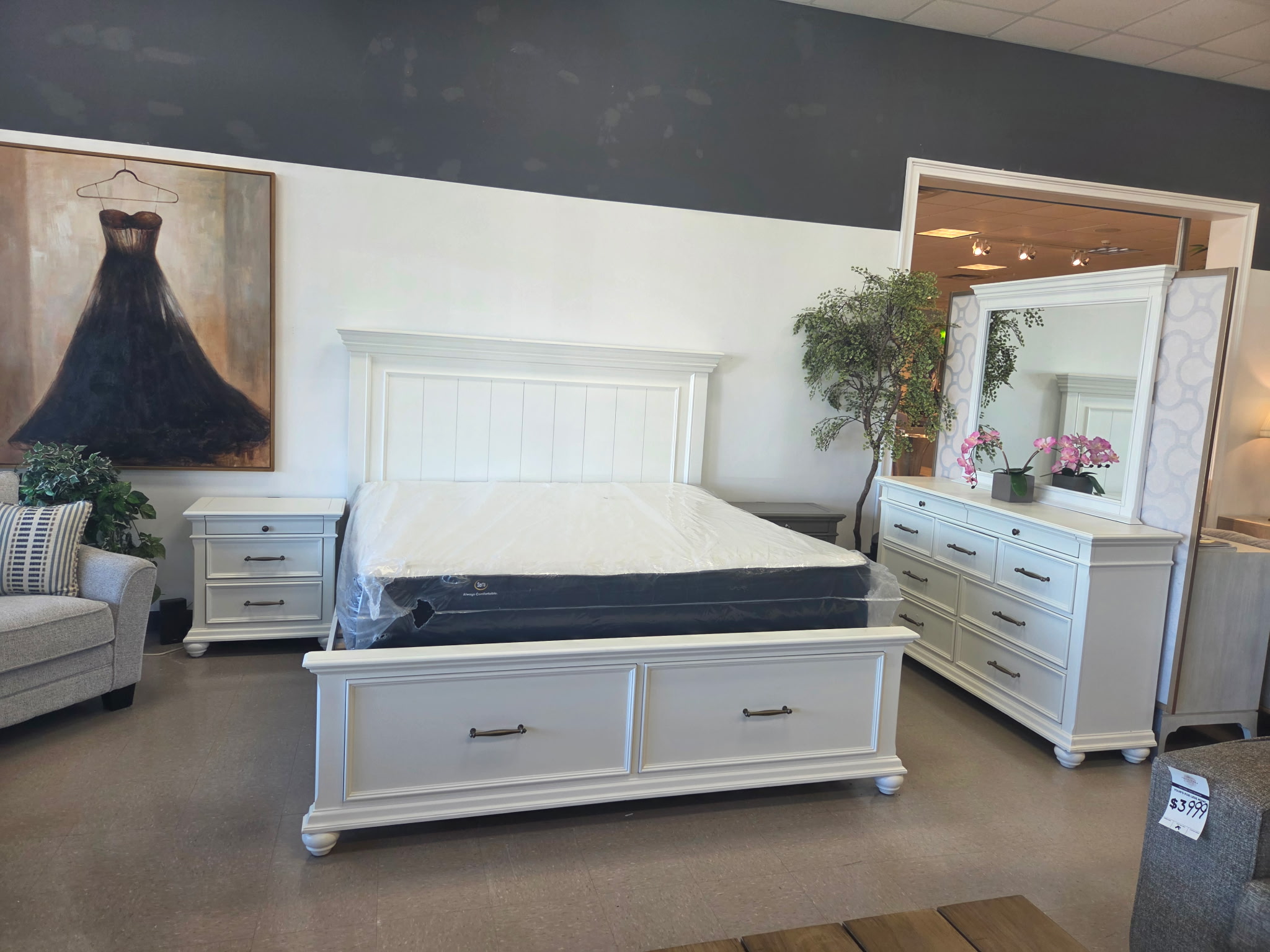White storage bed with matching dresser, mirror and nightstand