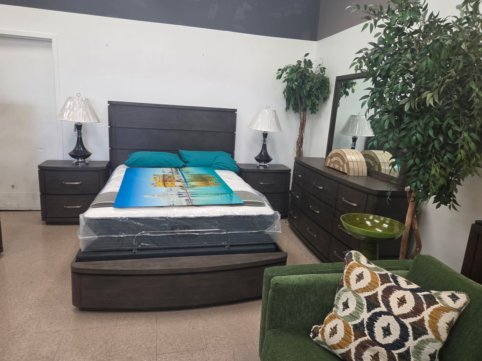 Dark wood bedroom set with colorful bedding