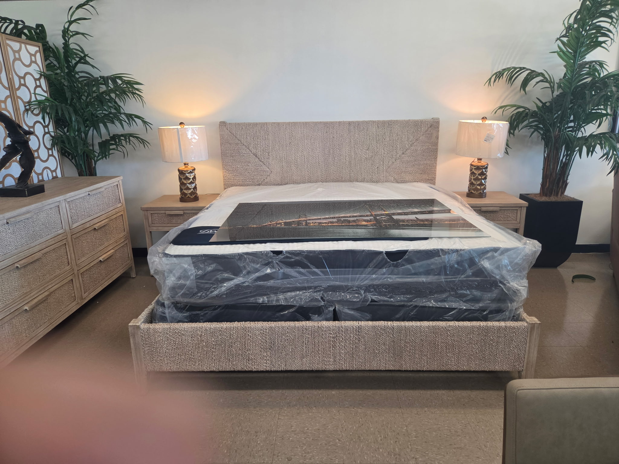 Textured coastal bedroom set with matching dresser and nightstands