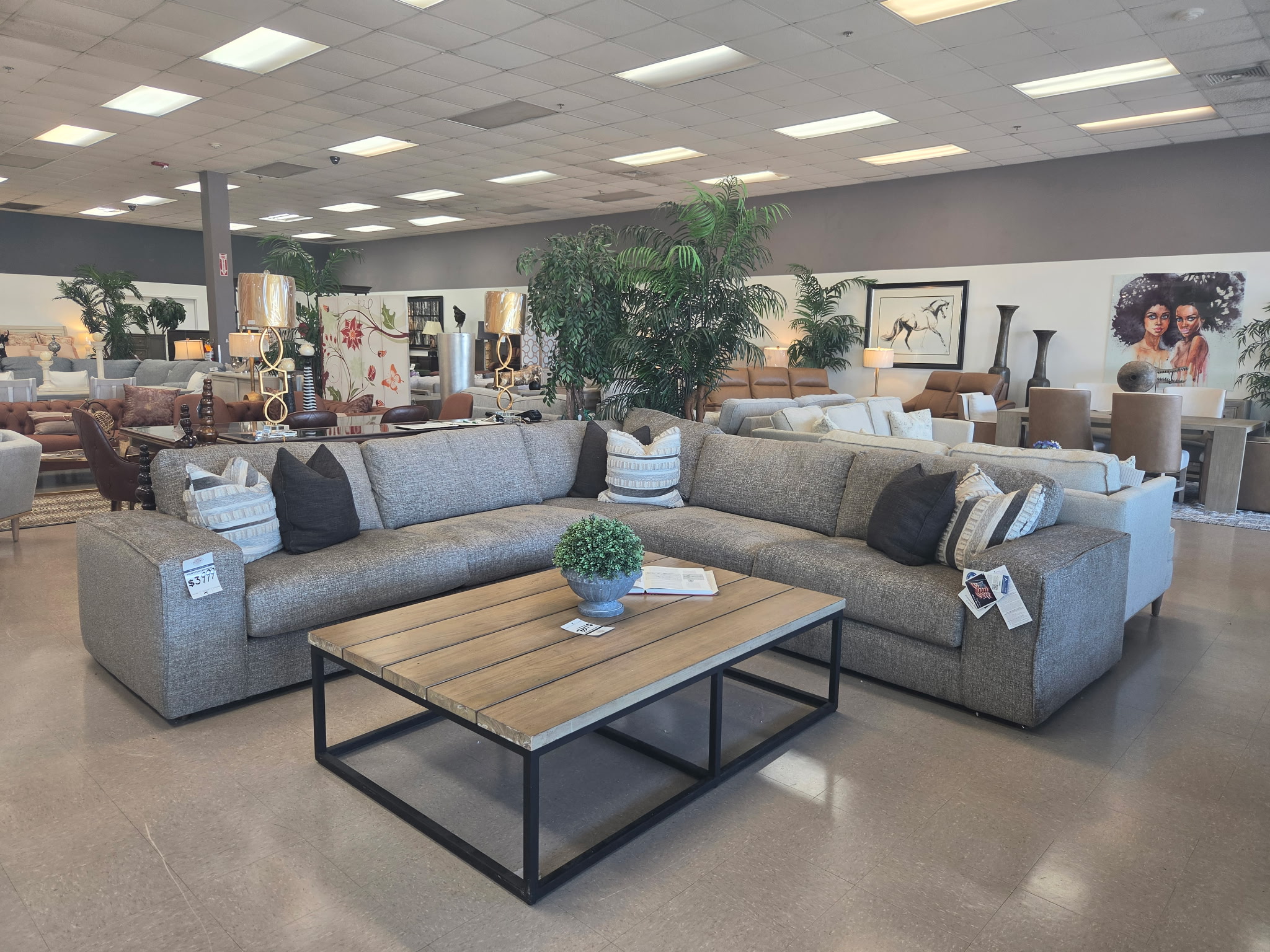 Gray sectional living room set with coffee table and accessories